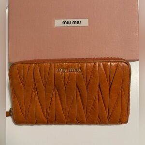 Miu Miu Leather Round Zippy Wallet Orange w/gold hardware